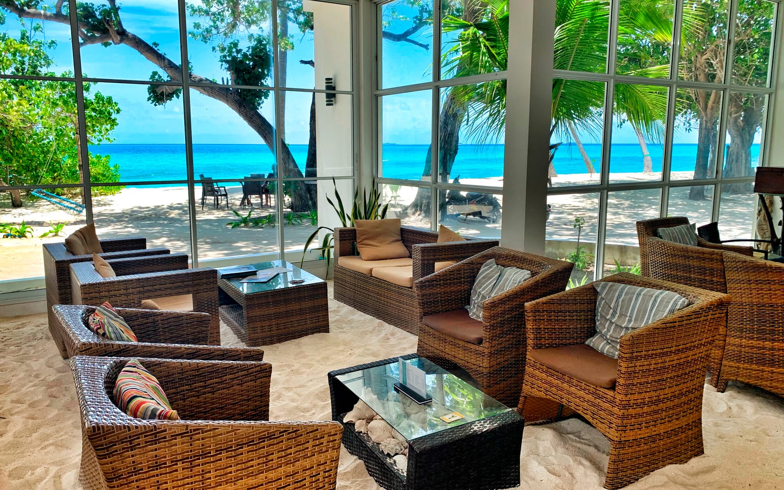 Athiri Beach Maldives infinity pool by the sand