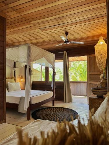 Iru Maldives Balinese-style room and beachside path, Thulusdhoo
